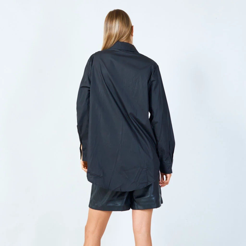 Chic sequin-embellished button-up blouse