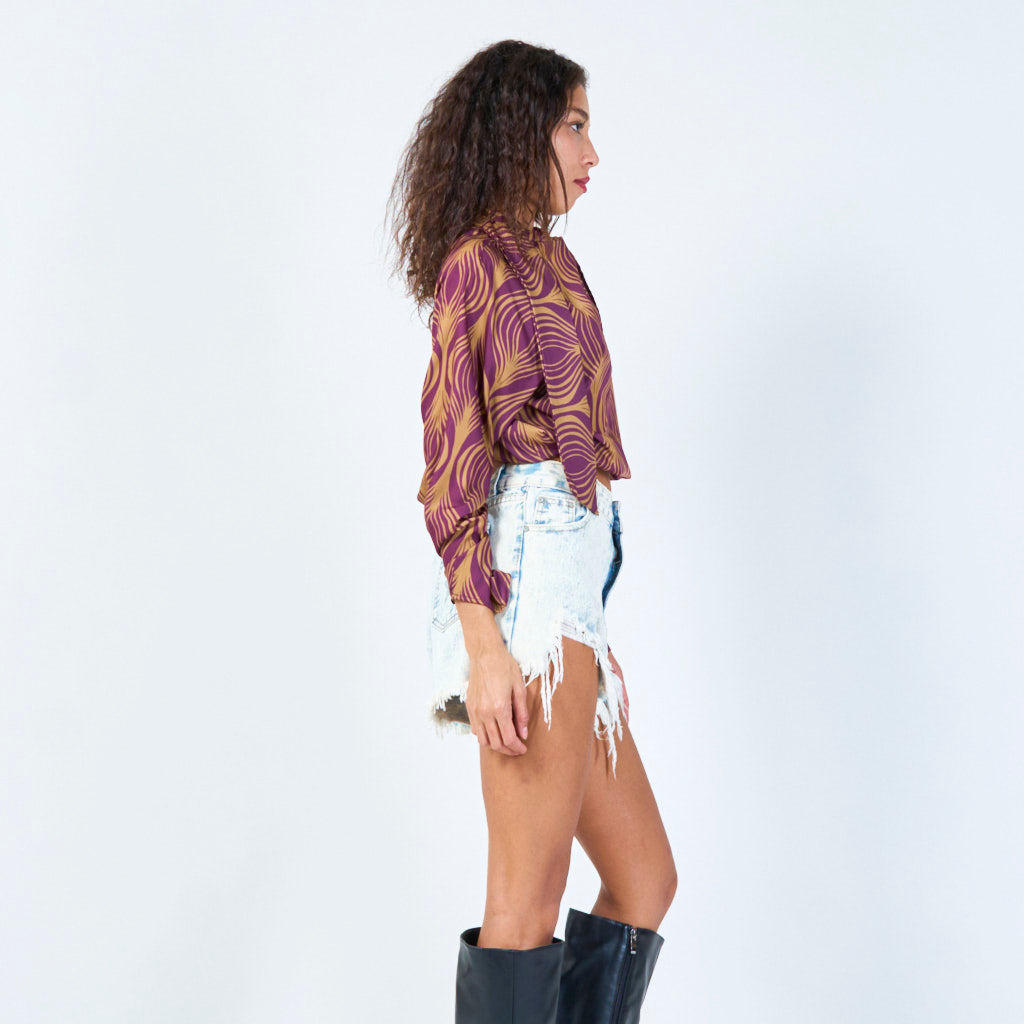 Floral print long sleeve tie-neck blouse