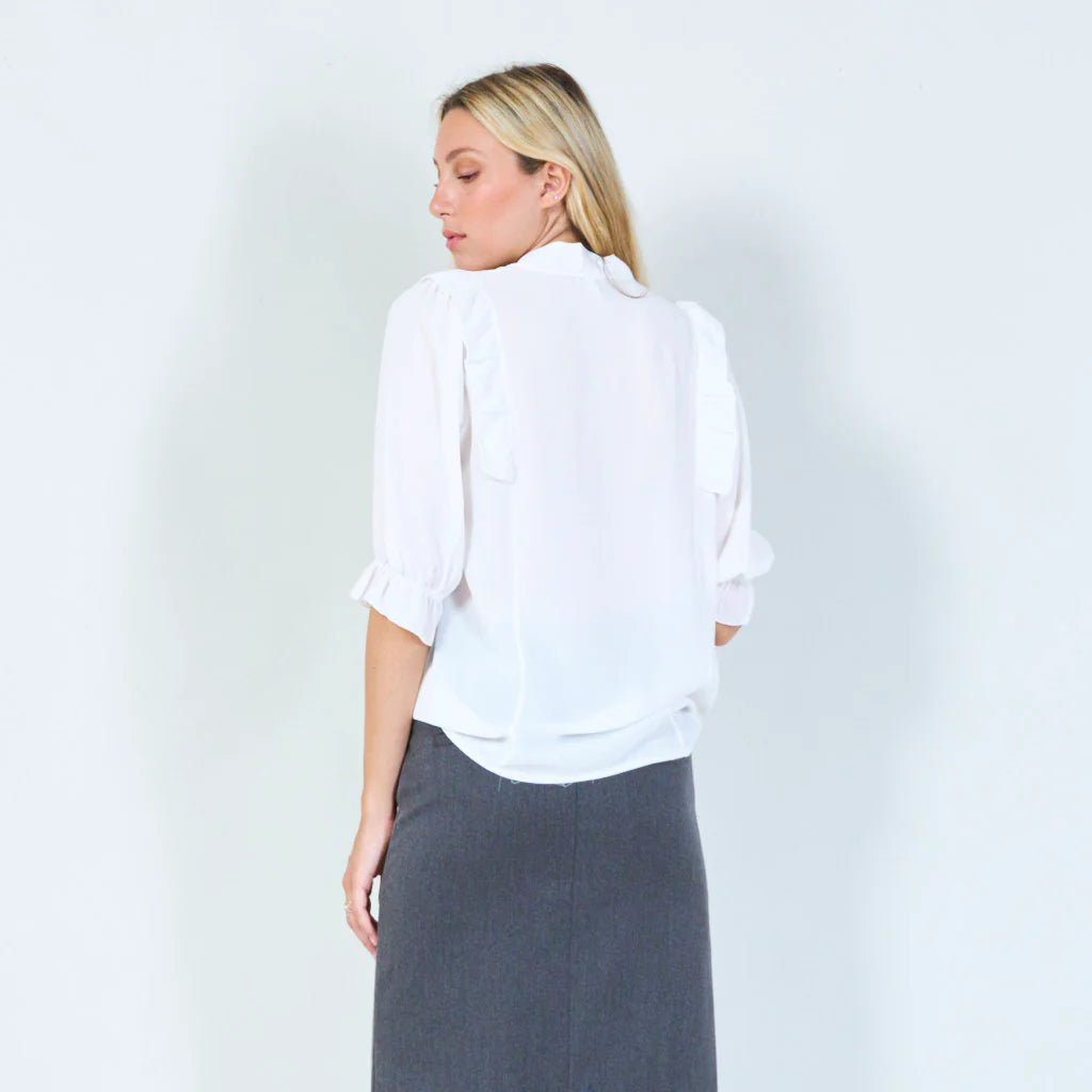 Ruffle detail tie-neck blouse