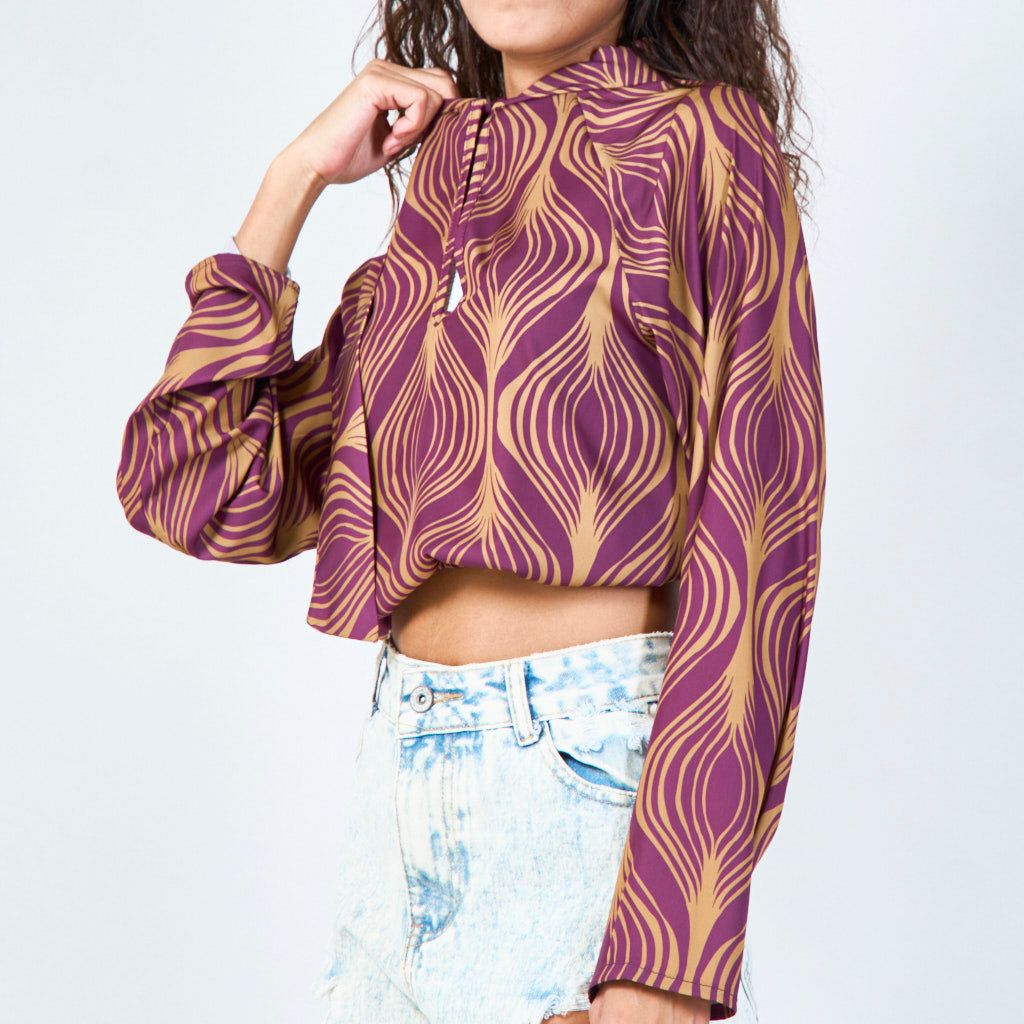 Floral print long sleeve tie-neck blouse